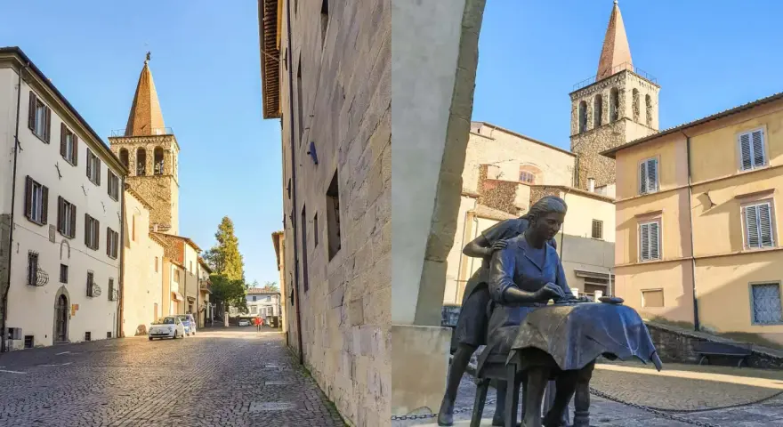 Statua di donne al lavoro, con campanili e palazzi storici sullo sfondo. Un assaggio di cosa vedere a Sansepolcro.