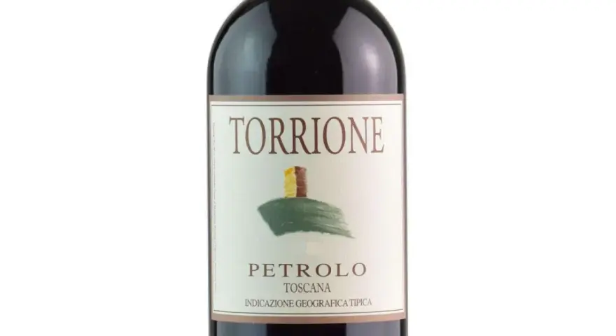 Bottle of Torcione Petrolo wine from Toscana, with a label featuring a drawing of a tower on a hill.